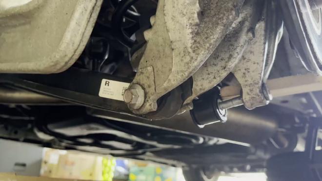 Lower rear shock mounting stud on a Honda Odyssey