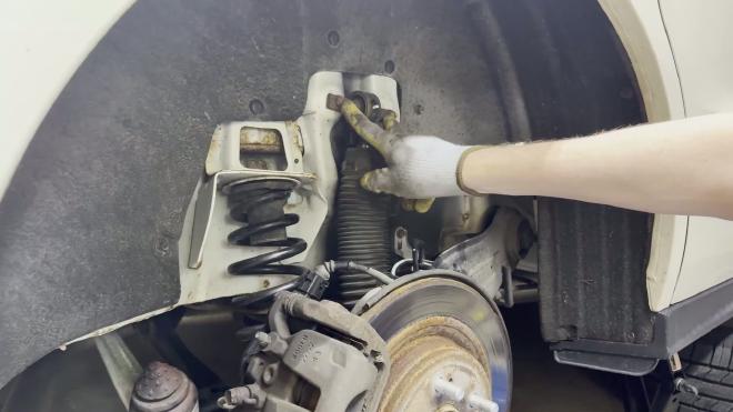Two upper mounting nuts on the Honda Odyssey rear shock
