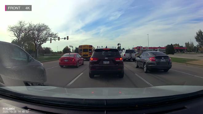 FITCAMX 4K front camera on a multi-lane road in daylight