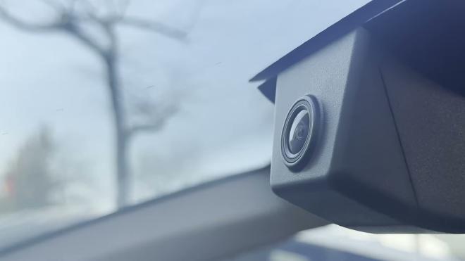 Close-up of the FITCAMX 4K lens on the mirror housing