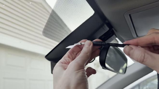 Connecting the rear camera cable to the socket on the FITCAMX housing