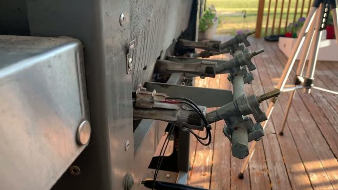 Detaching the igniter wires from the Weber grill control panel